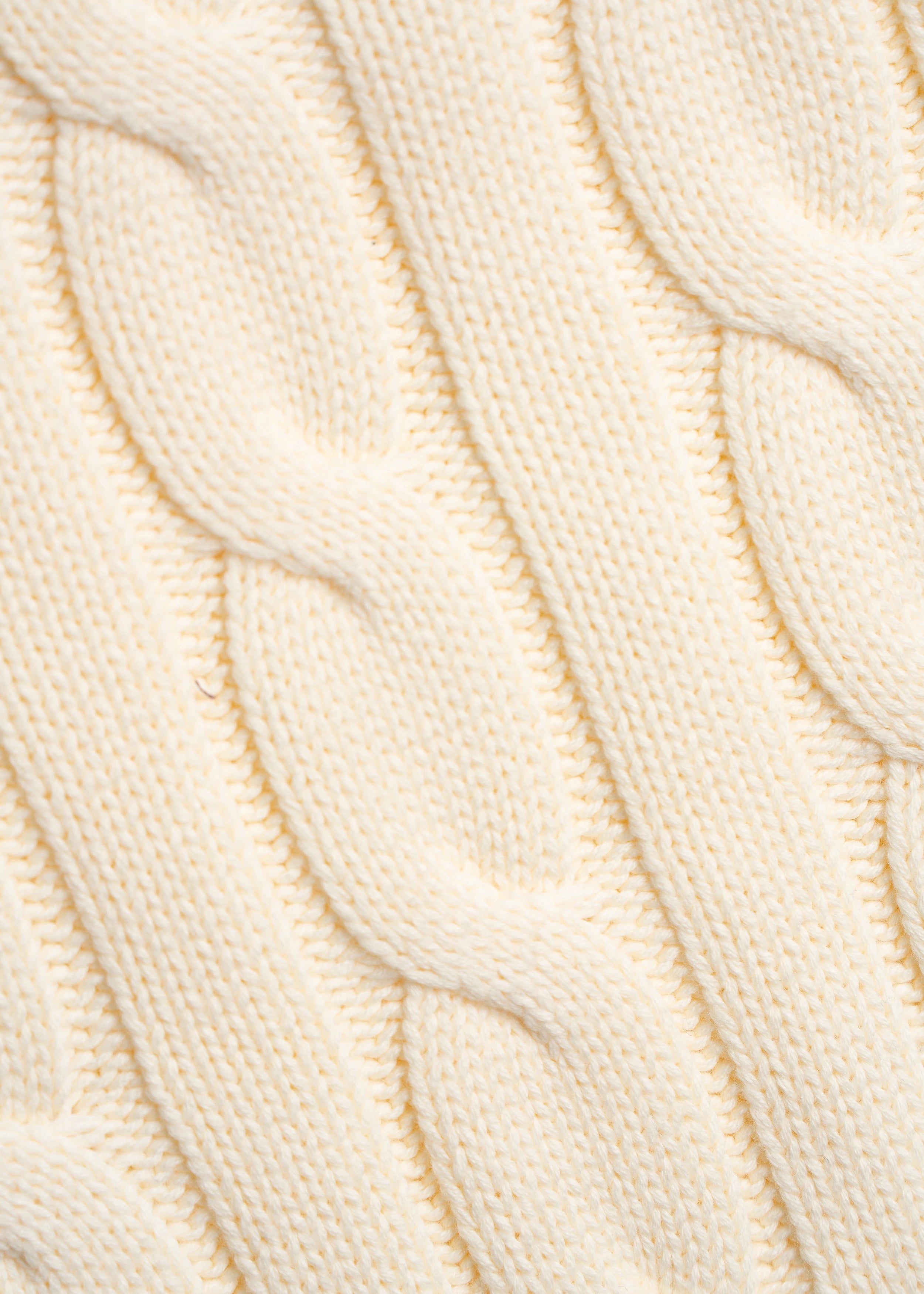 La Corsia Wide Sleeve Cable Knit sweater in cream, crafted from heavyweight cotton with a quarter zip, funnel neck, and sculpted oversized silhouette.