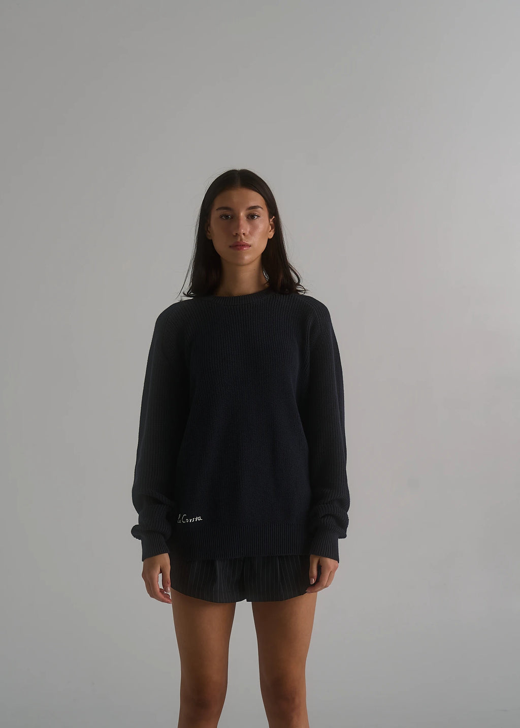 La Corsia Cotton Fisherman Sweater in deep navy, studio model shot
