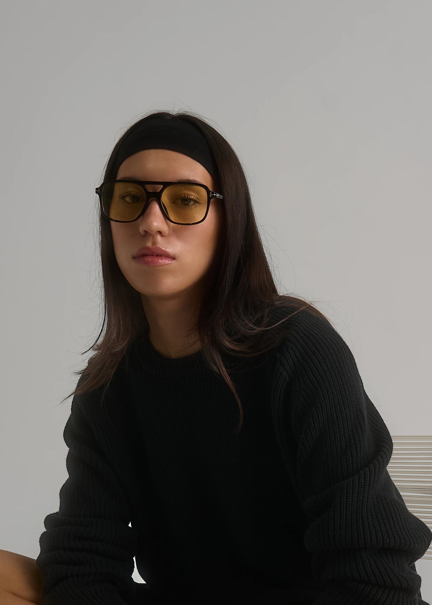 La Corsia Cotton Fisherman Sweater in black, studio model shot