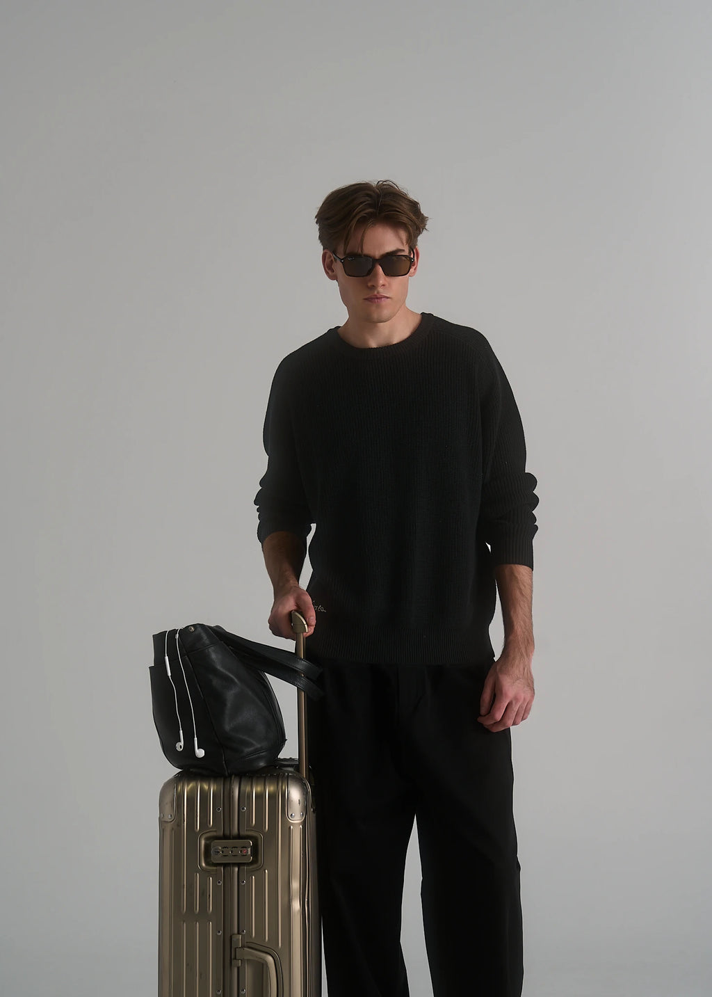 Model wearing the La Corsia Cotton Fisherman Sweater in black