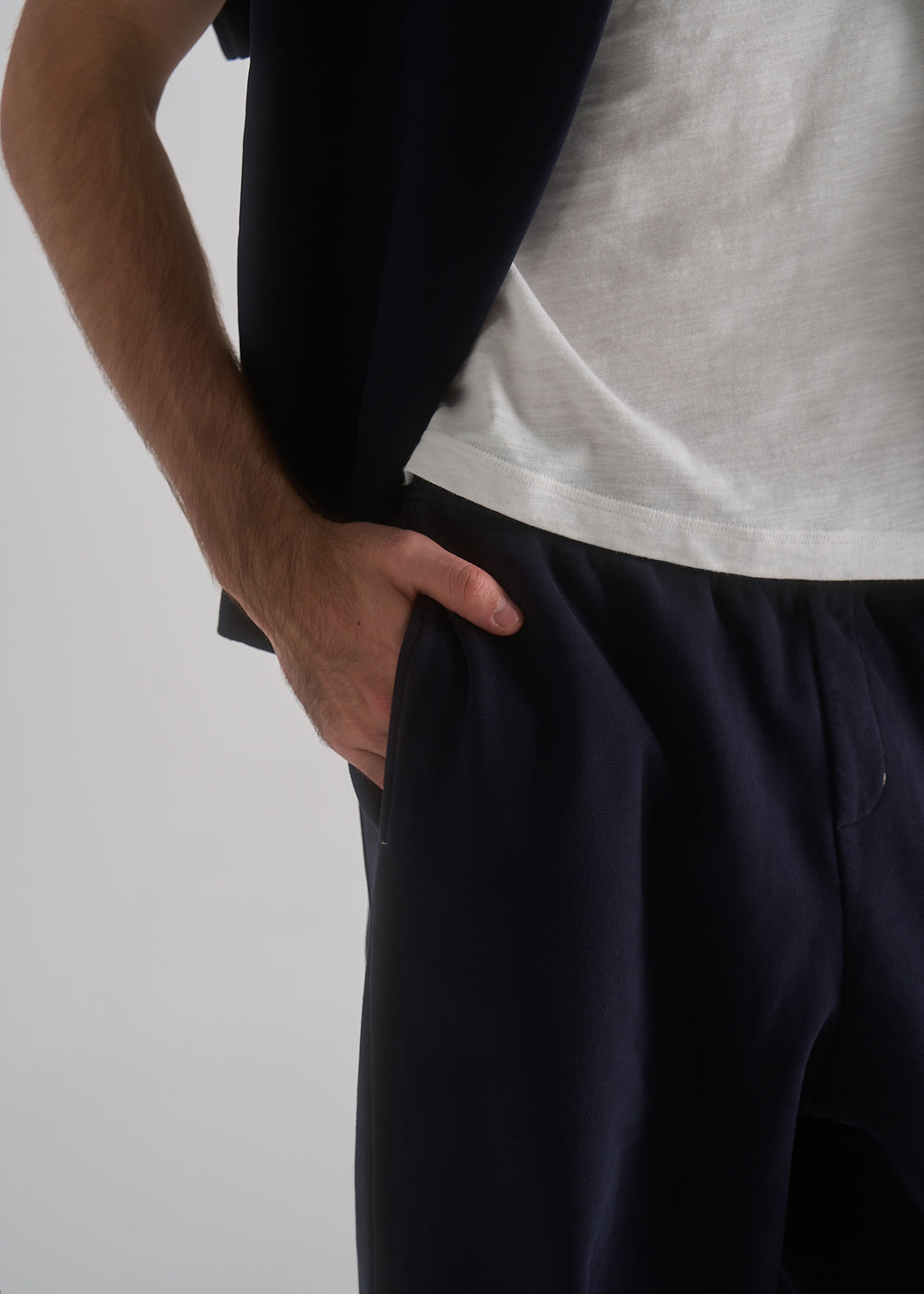 La Corsia Oversized Track Pant in washed navy, studio model shot
