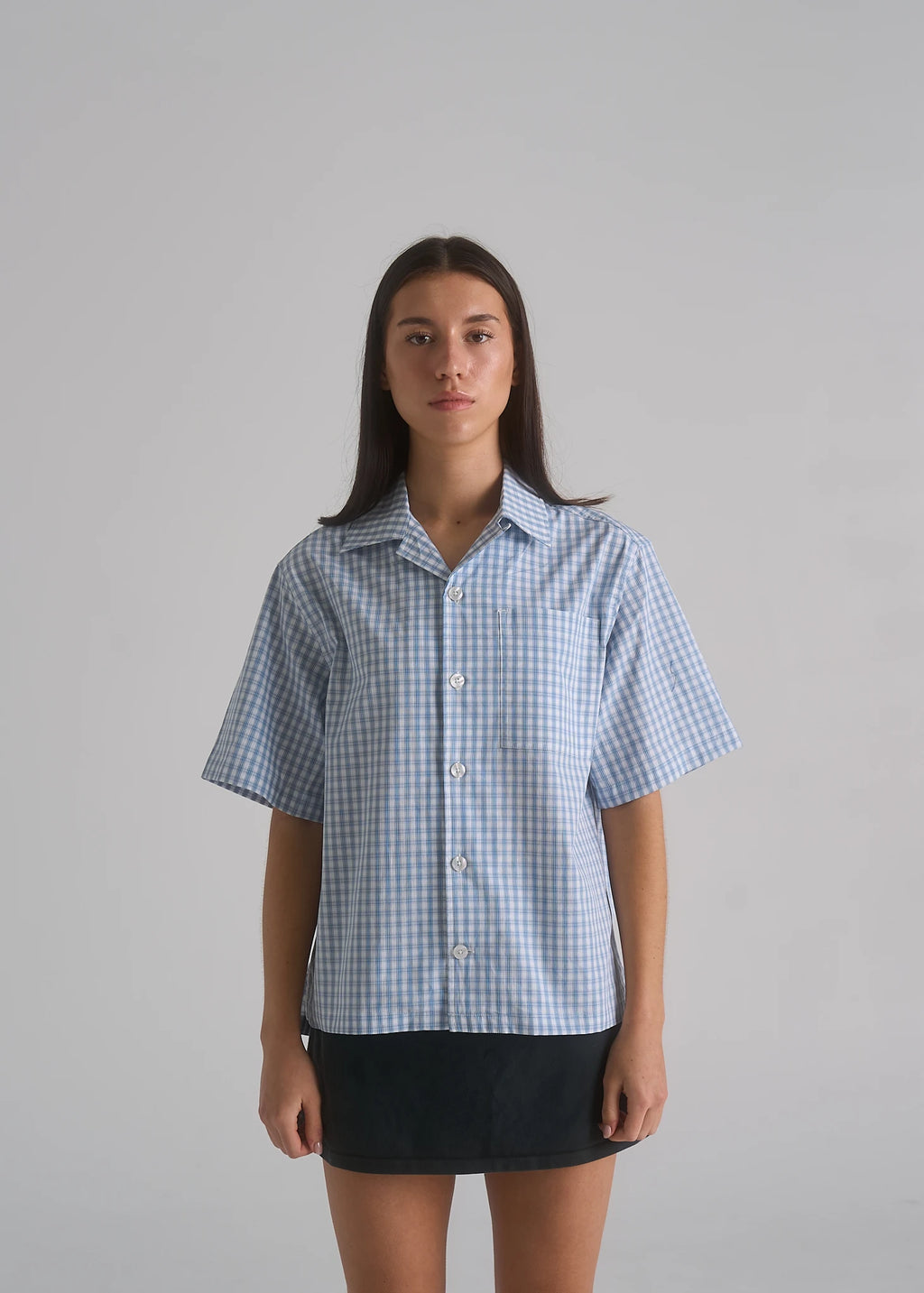 La Corsia Oversized Short Sleeve Shirt in light blue plaid, studio model shot