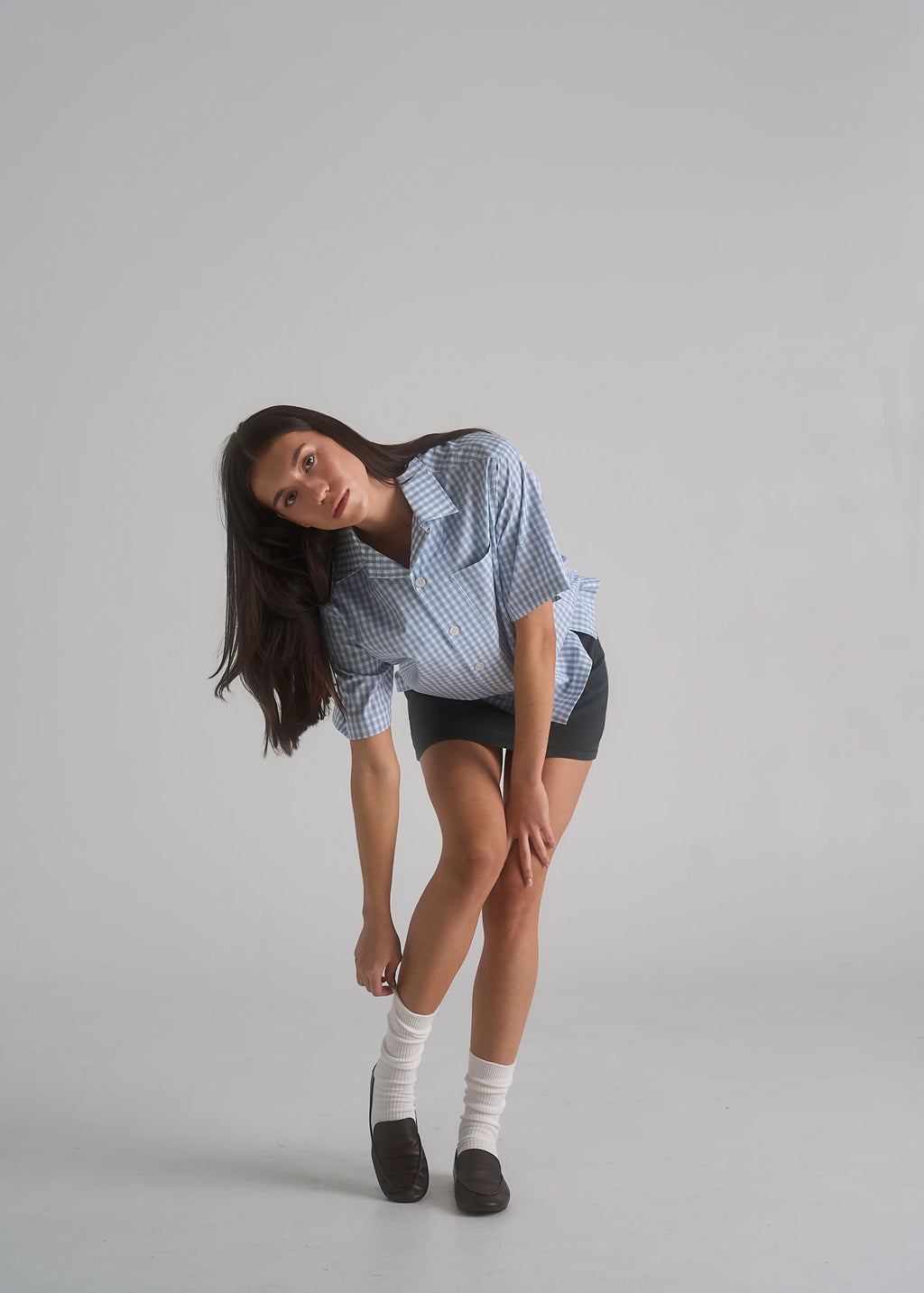 La Corsia Oversized Short Sleeve Shirt in light blue plaid, studio model shot