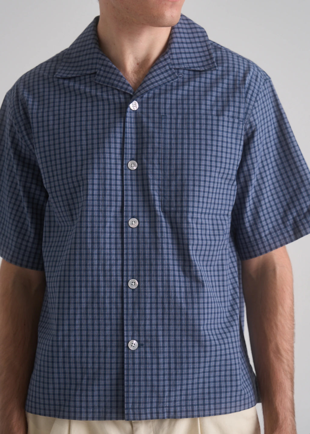 La Corsia Oversized Short Sleeve Shirt in dark blue check, studio model shot