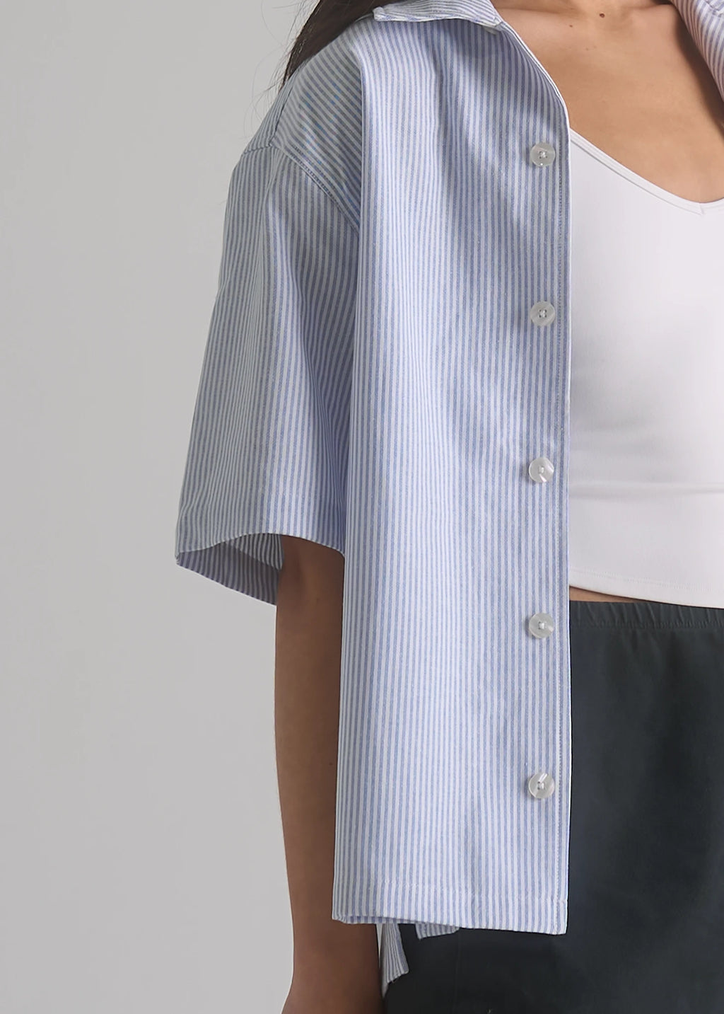 La Corsia Oversized Short Sleeve Shirt in oxford stripe, studio model shot