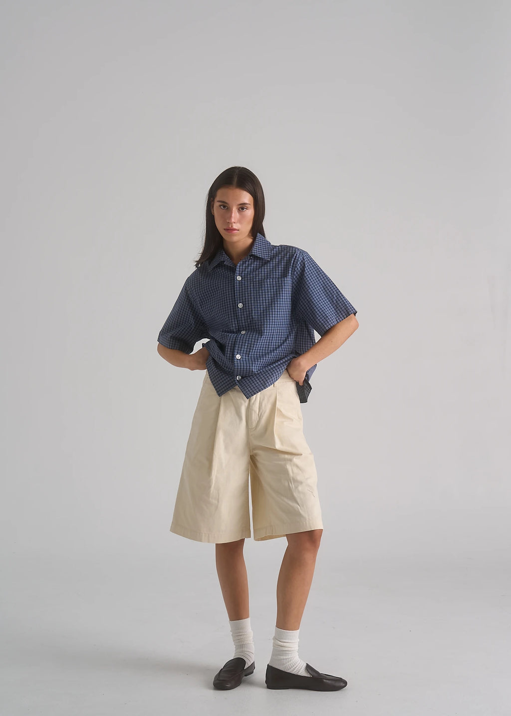 La Corsia Oversized Short Sleeve Shirt in dark blue check, studio model shot
