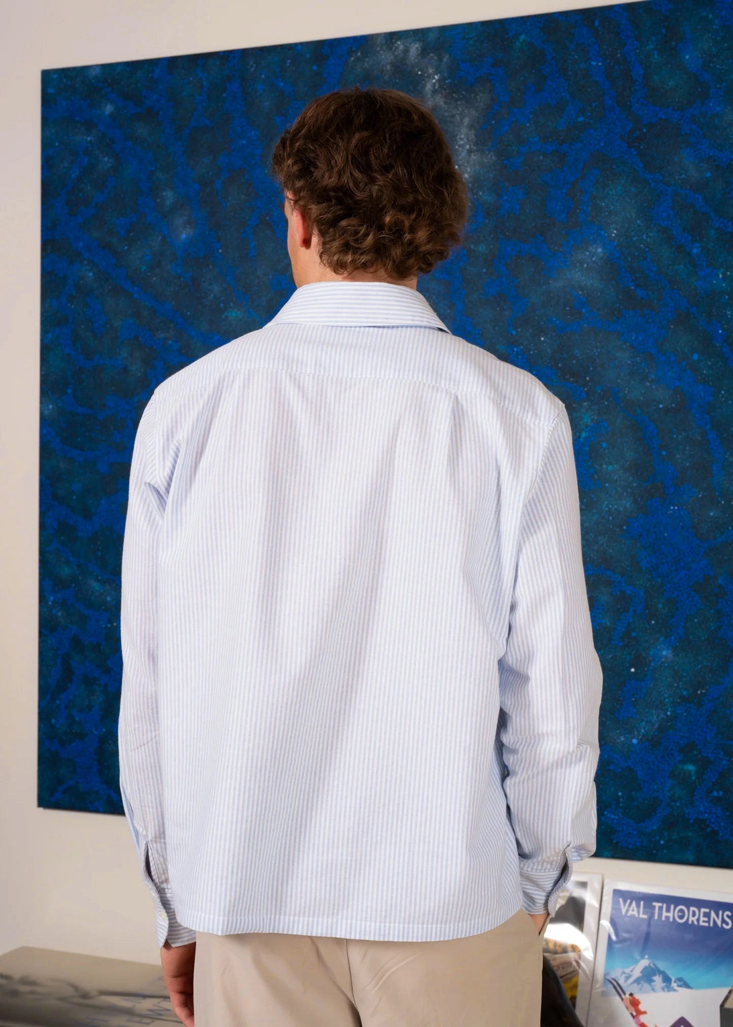 Model wearing Blue Stripe Business Shirt. Closeup detailed view from back.