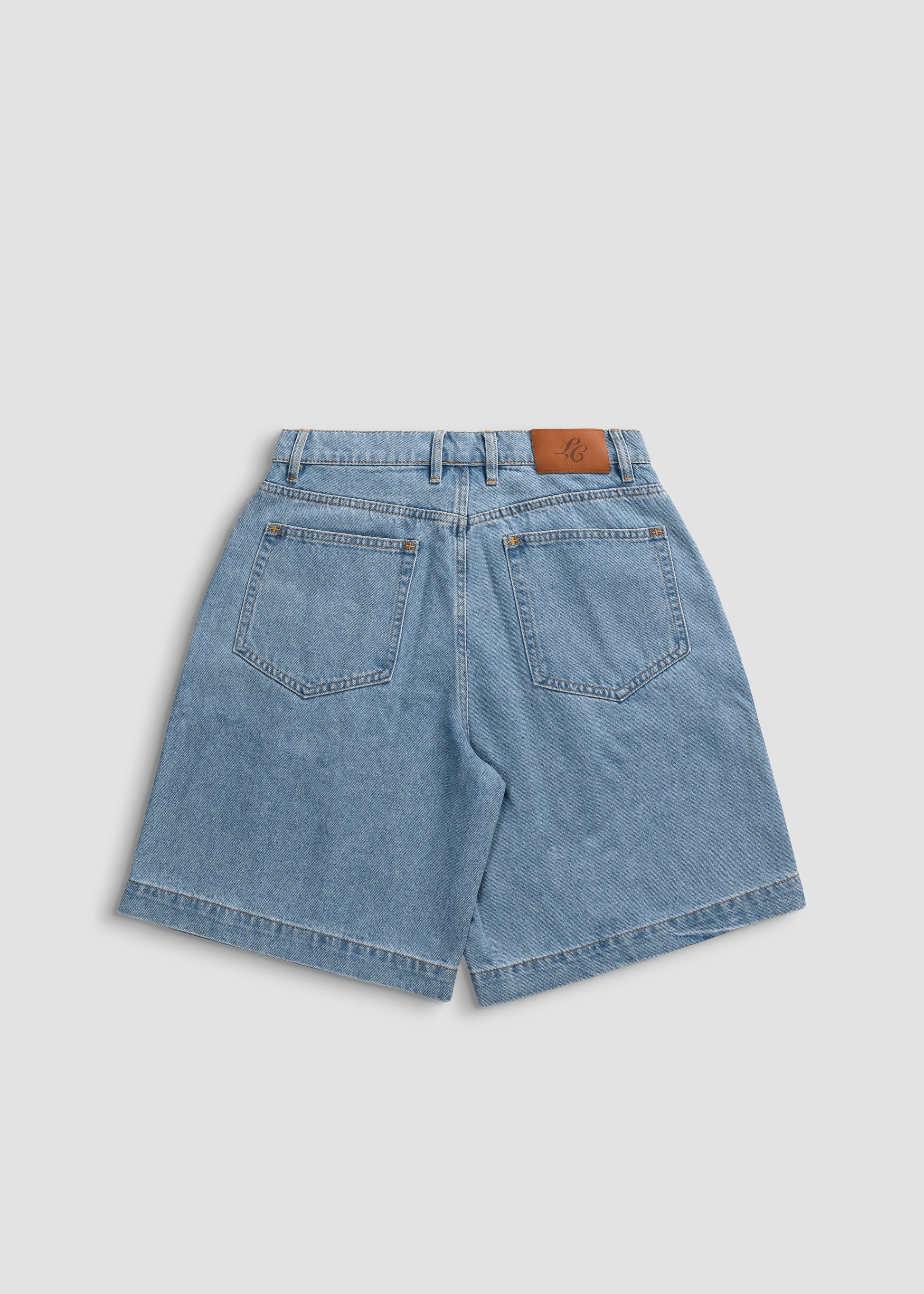 Wide Leg Pleated Shorts Denim. La Corsia Jorts 100% Cotton. Flat lay back
 photography