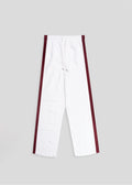 Flat lay details of straight leg side seam pant in white and merlot.