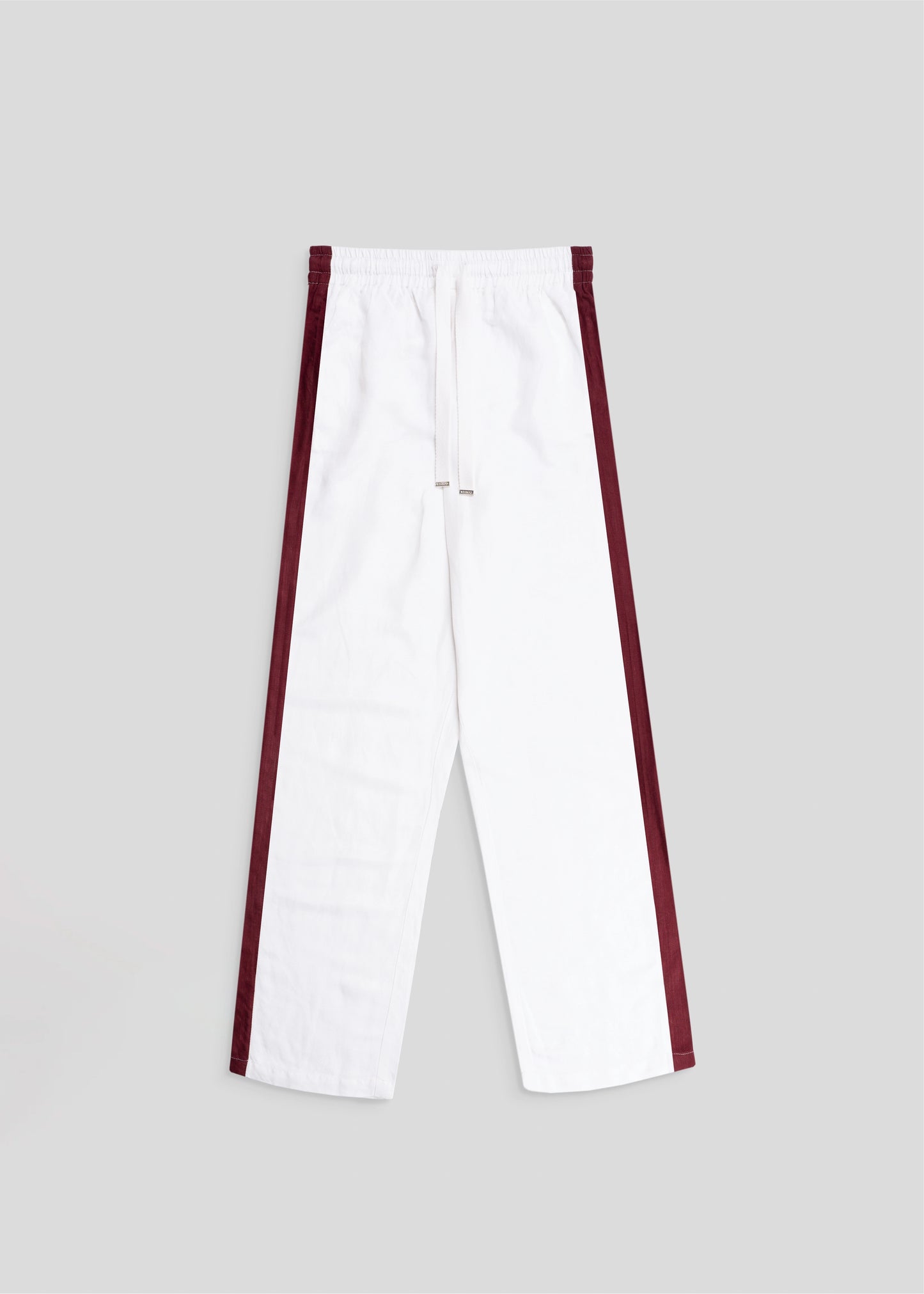 Flat lay details of straight leg side seam pant in white and merlot.