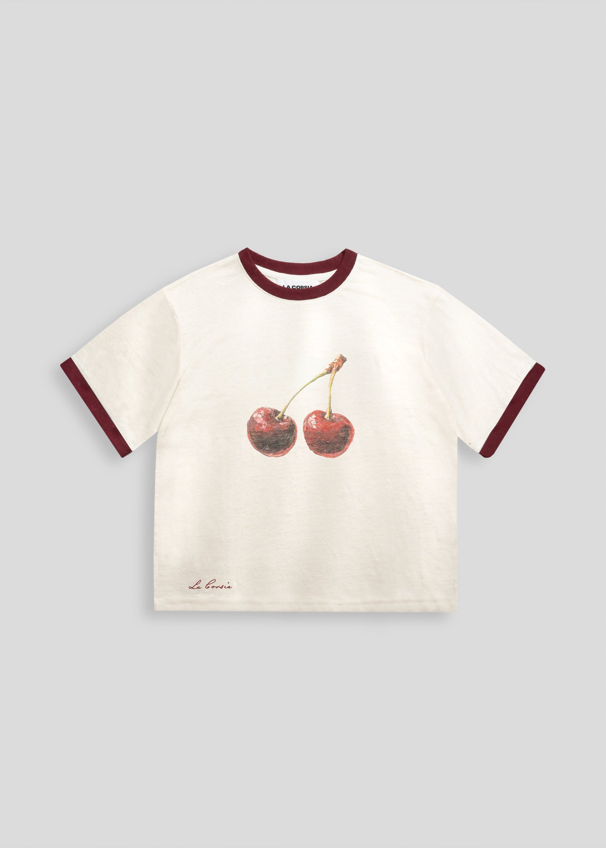 La Corsia Jersey Knit Ringer Tee Cherry Print Summer 2024 Flat Lay Image