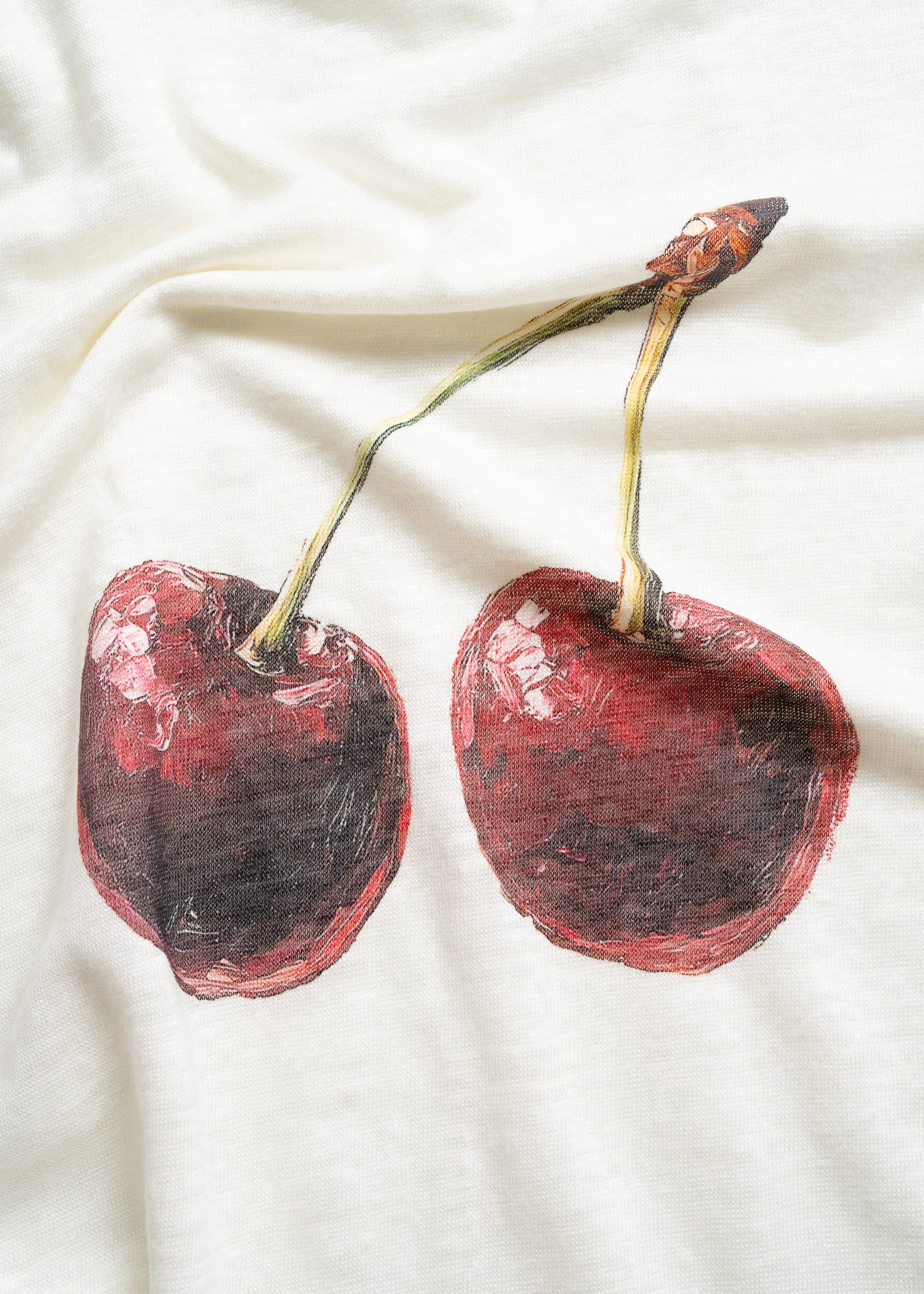 La Corsia Jersey Knit Ringer Tee Cherry Print Summer 2024 Flat Lay Image