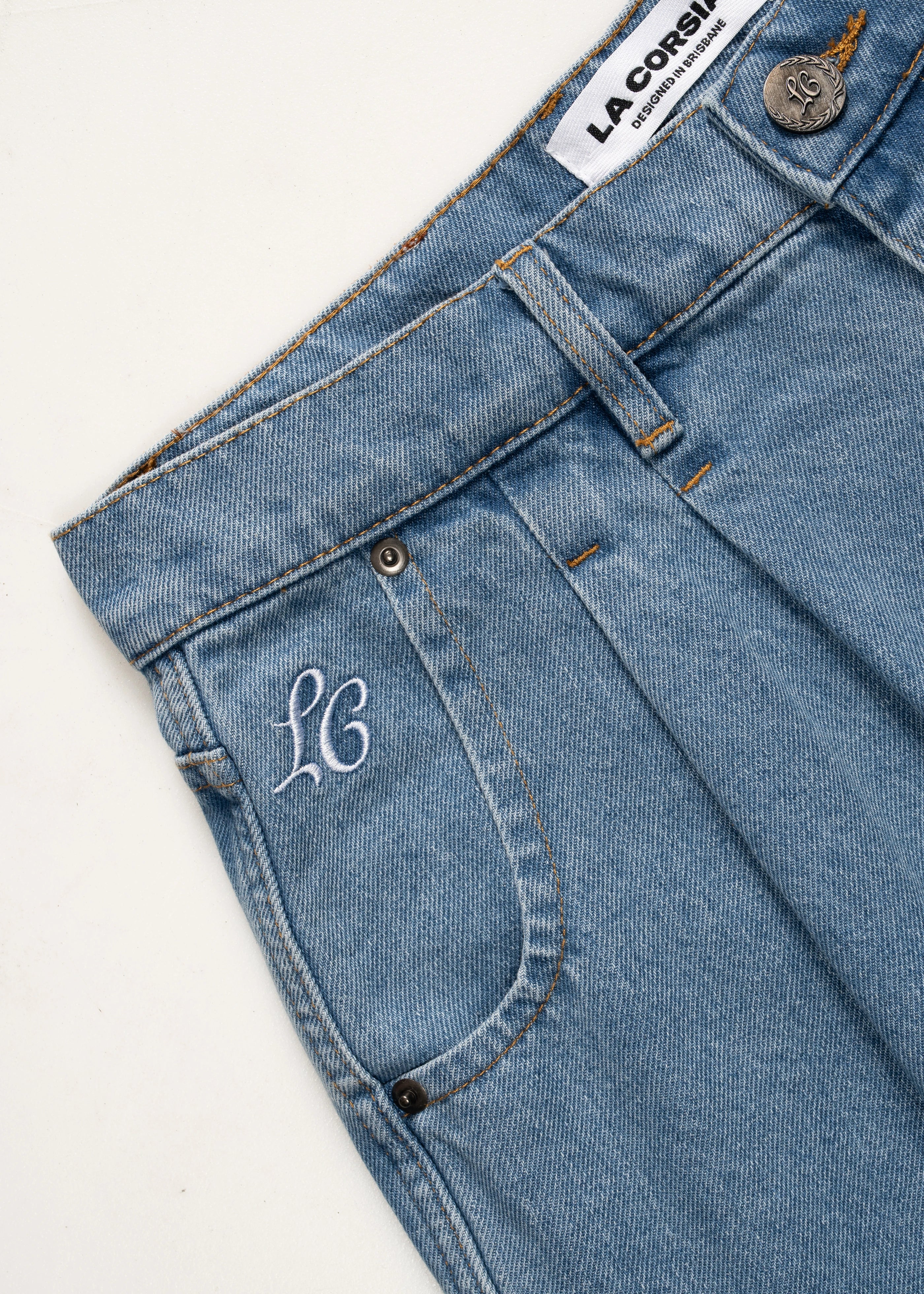 Wide Leg Pleated Shorts Denim. La Corsia Mens Jorts 100% Cotton. Flat lay closeup front photography
