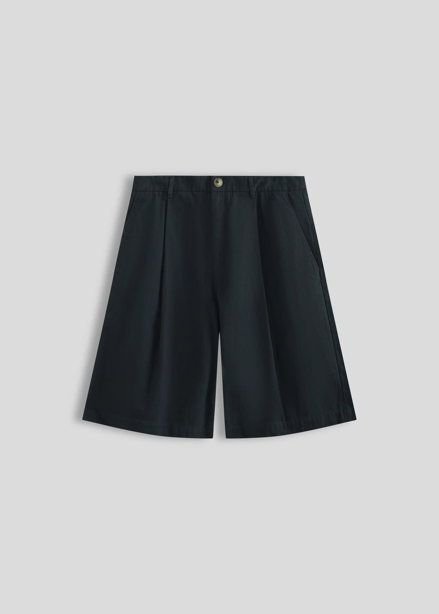 La Corsia Wide Leg Pleated Short in washed navy, product flat lay on a plain background