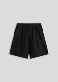 Black shorts on a light gray background