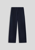 La Corsia Oversized Track Pant in washed navy, flat lay on a plain background