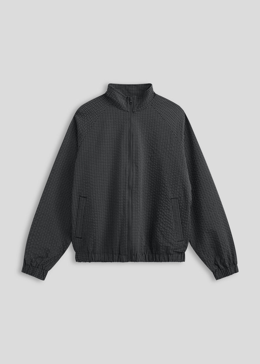 Corsia Country Club Windbreaker in navy check, product flat lay on a plain background