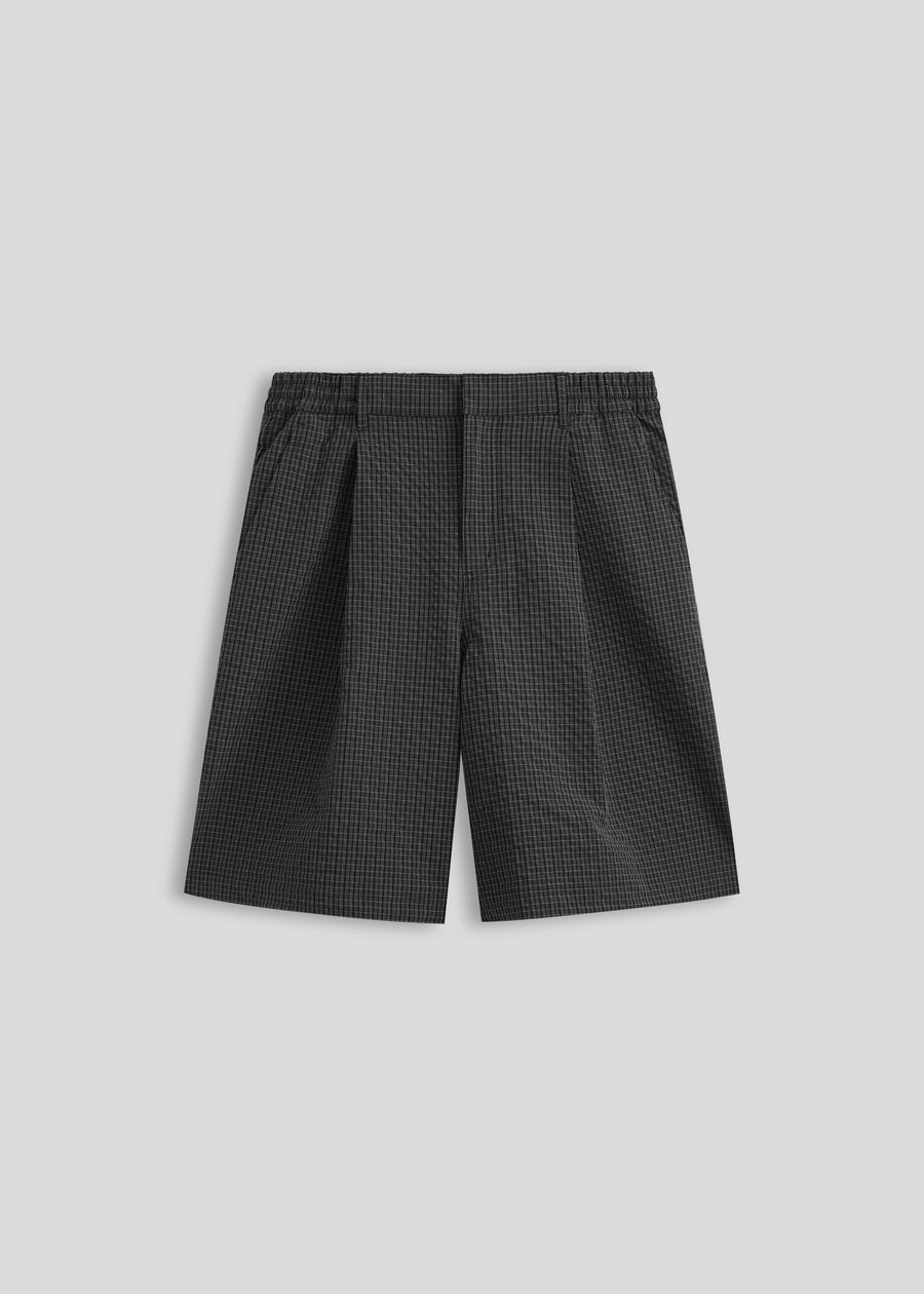 Corsia Country Club Short in navy check, product flat lay on a plain background