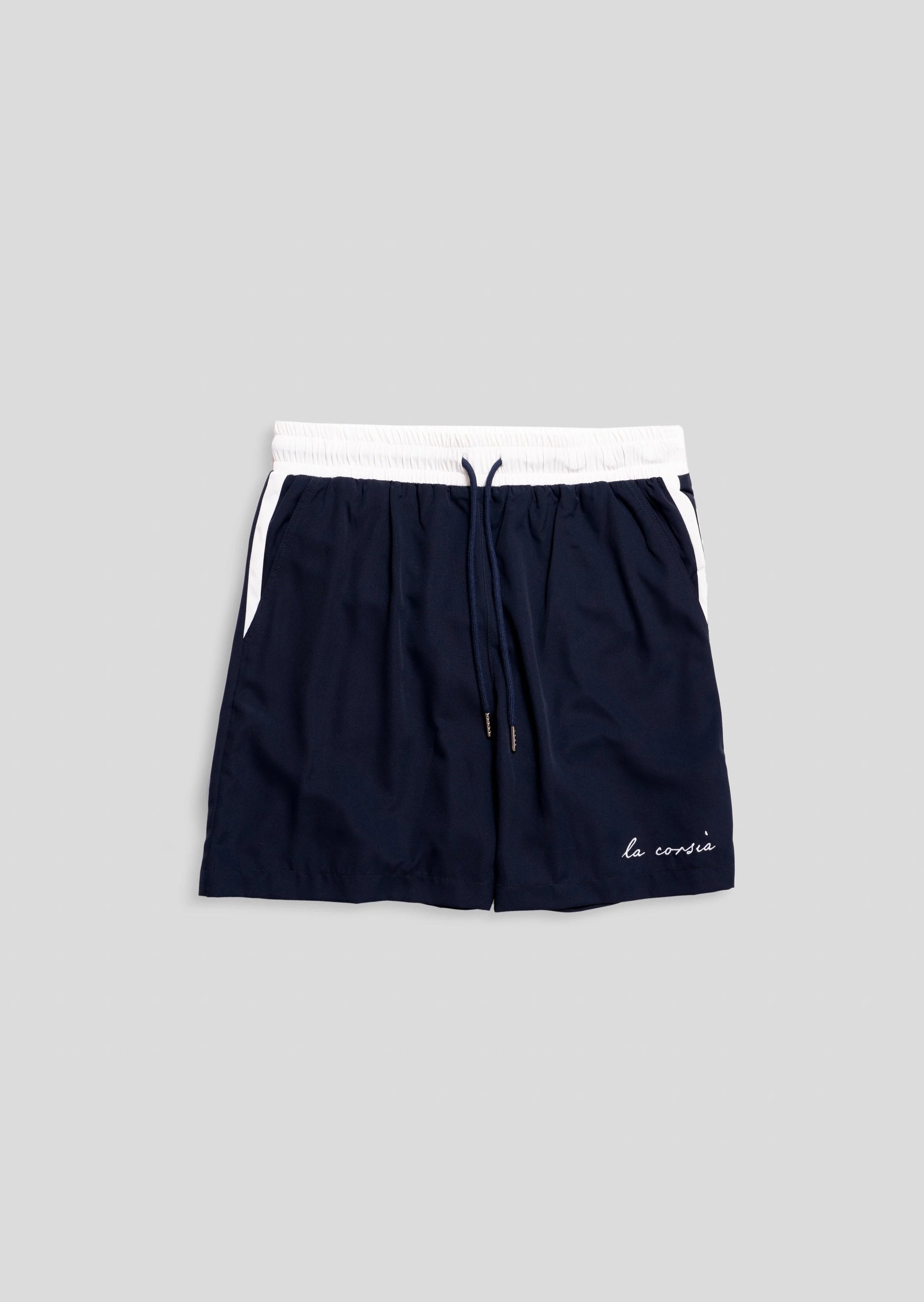 Flay lay details of Navy Swim Short La Corsia embroidery.